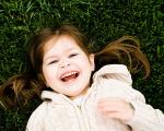 a young girl laughing