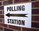 Sign pointing to polling station