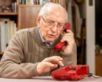Older person of landline telephone
