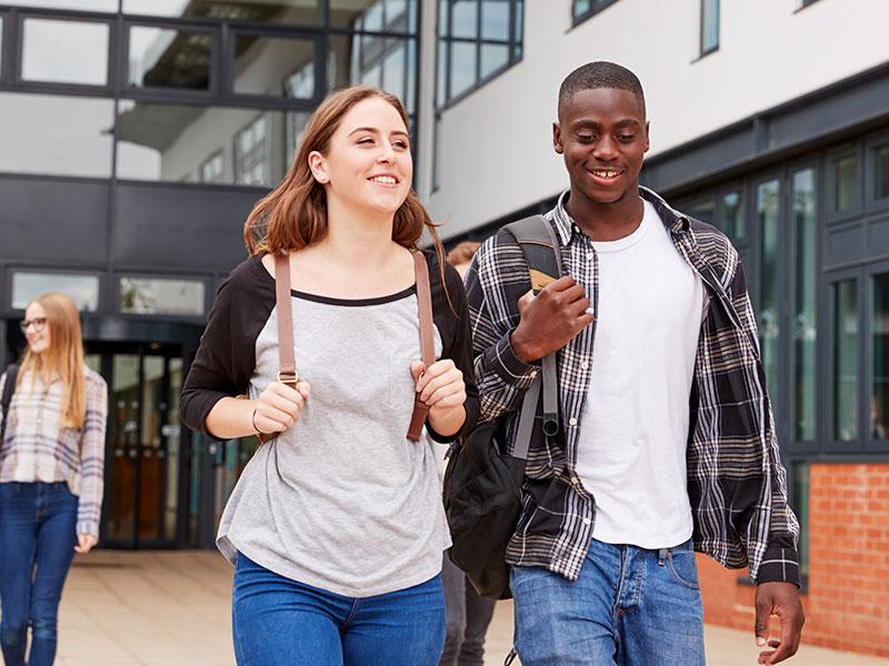 Two young people at college
